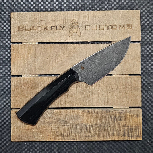 Rhino with Black Micarta
