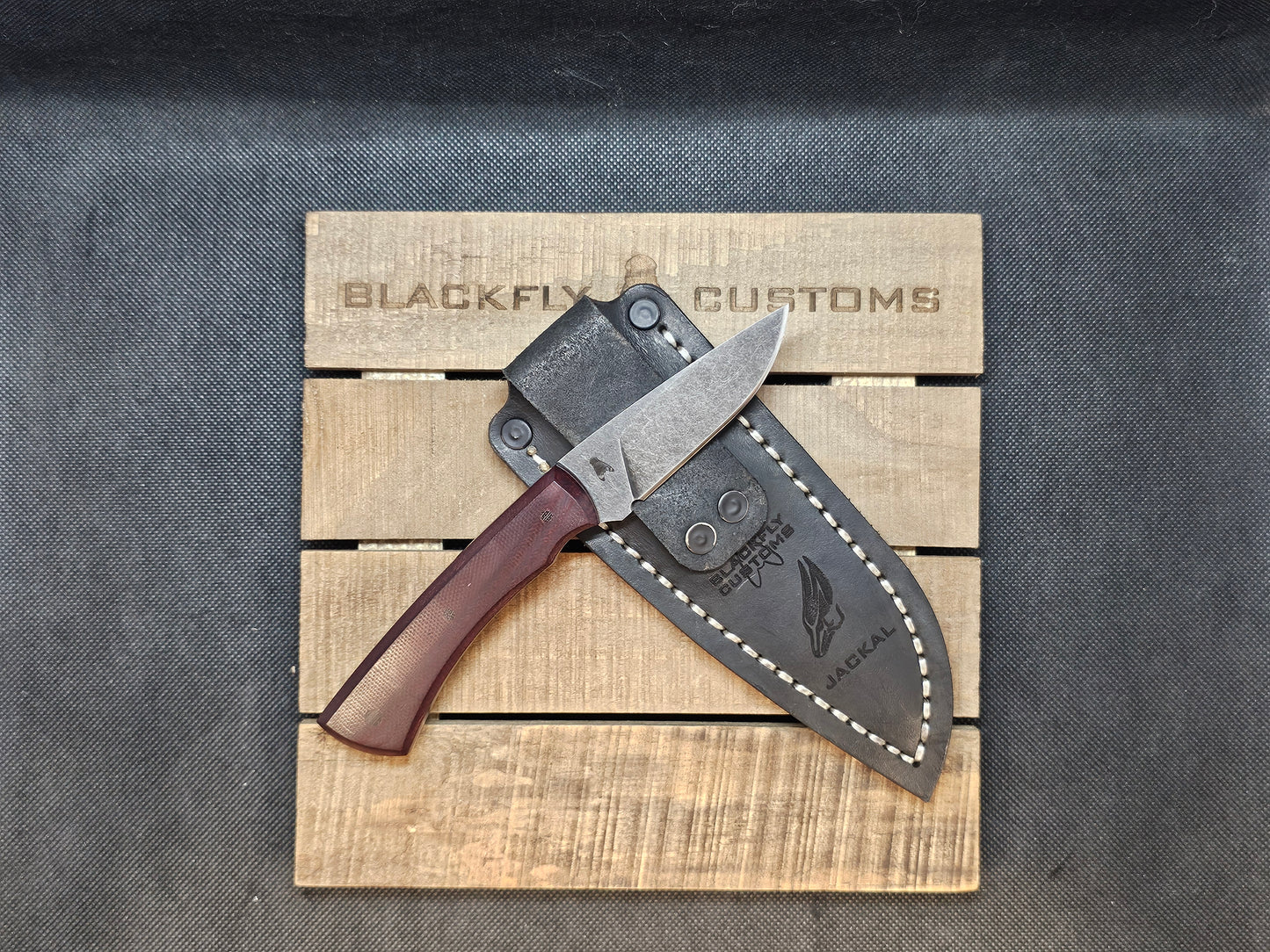 Jackal with Maroon Micarta (AVAILABLE TO ORDER)