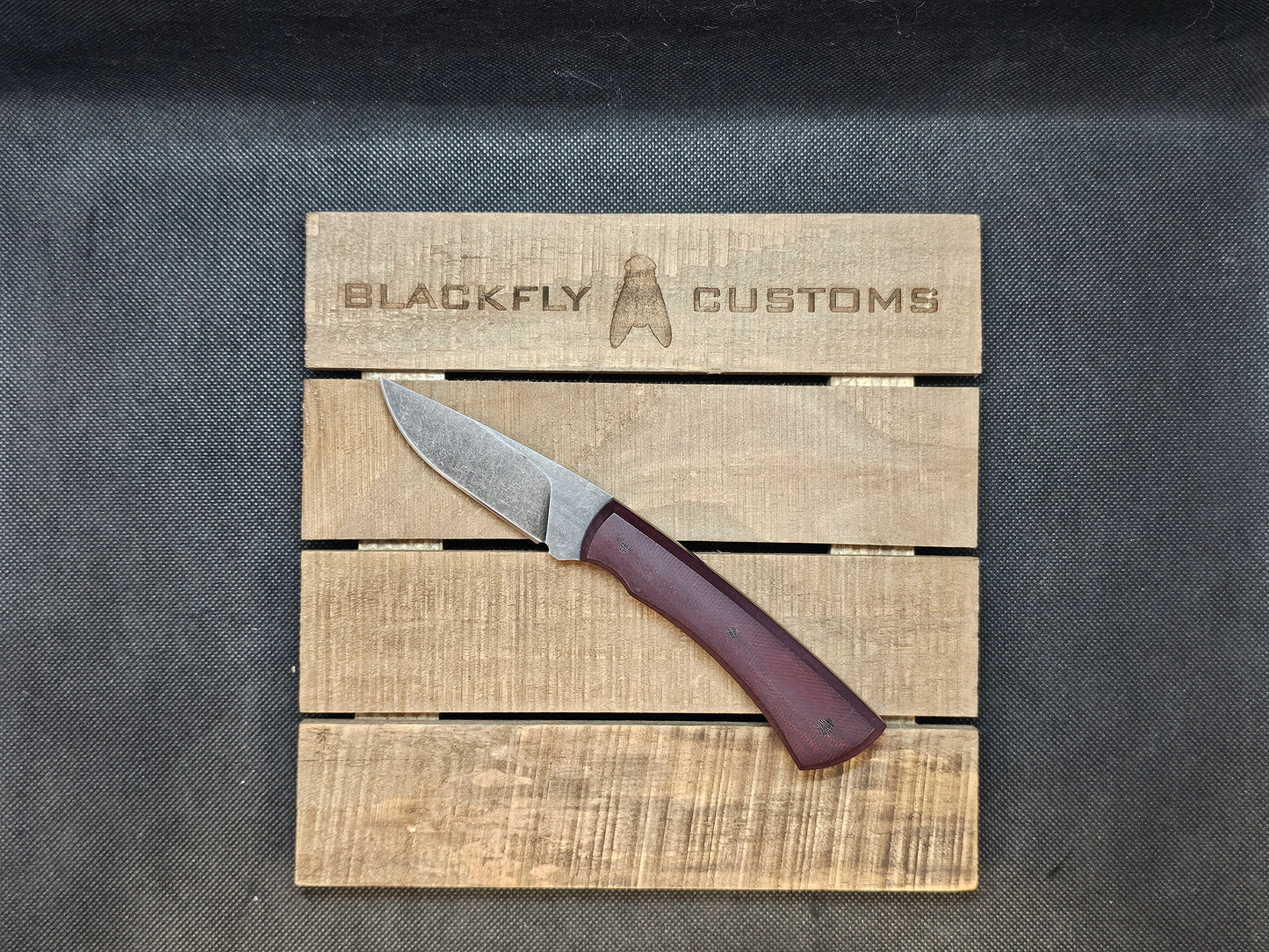 Jackal with Maroon Micarta (AVAILABLE TO ORDER)