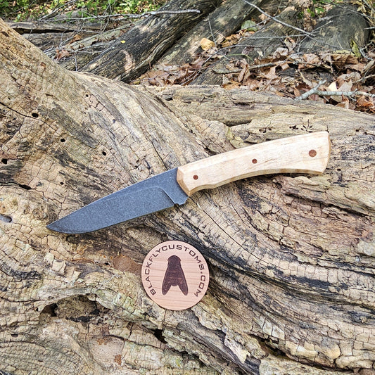 Mongoose with Curly Maple